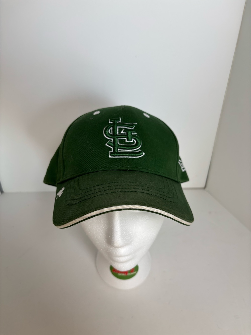 New Era St. Louis Cardinals green baseball cap with white embroidered logo